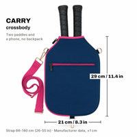 Navy blue crossbody CARRY cover with two paddle handles sticking out and the dimensions: 29 cm (11.4 in) high, 21 cm (8.3 in) wide and strap from 66 to 140 cm (26 to 55 in)