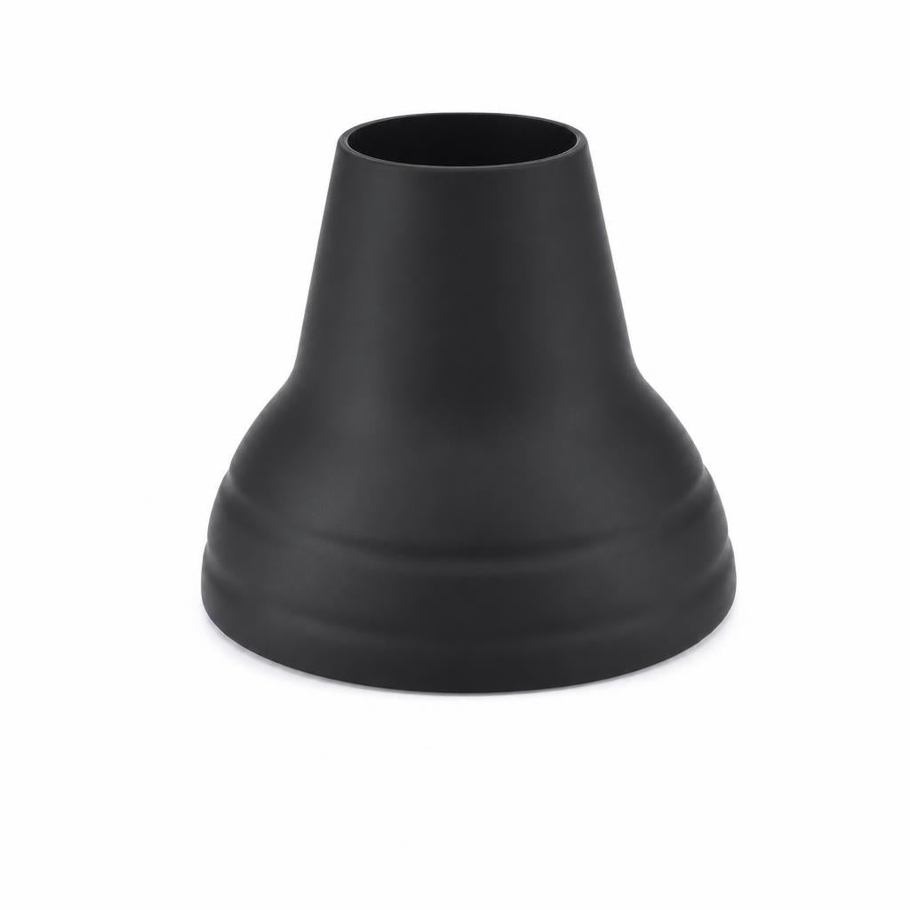 Black silicone piece of the SCOOP ball pickup tool on a white background, three-quarter view