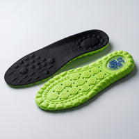 Plantillas de pickleball STRIDE: cara superior de malla negra y suela de lima con cápsula de gel